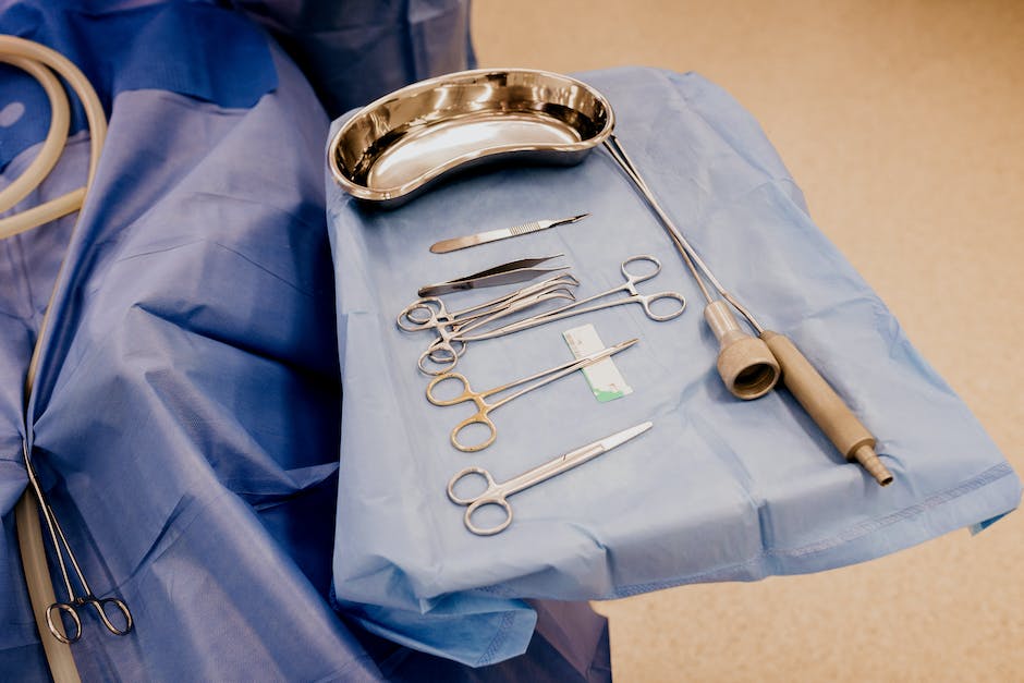 Silver Safety Pin on White Textile